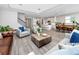 Open-concept living space showcasing kitchen, dining, and living areas at 8423 Praise Dr, Tampa, FL 33625