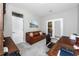 Office with wooden desk, leather sofa, neutral colors, and lots of light at 8423 Praise Dr, Tampa, FL 33625