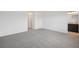 Spacious bedroom with neutral carpet and ample closet space, leading to an ensuite bathroom at 9508 Pyrenees Pl, Seffner, FL 33584