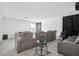 Well appointed home theater with tiered reclining seating, black out curtains and a sound system at 9508 Pyrenees Pl, Seffner, FL 33584