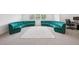 Large living room with circular sofa and light colored carpet at 9508 Pyrenees Pl, Seffner, FL 33584