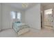 Bright, airy bedroom with a decorative princess theme, a bed and white curtains at 978 Signet Dr, Apollo Beach, FL 33572