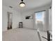 Bright bedroom with a minimalist style featuring neutral tones and natural light from the window at 978 Signet Dr, Apollo Beach, FL 33572