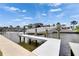 This image showcases a private boat lift on a canal, perfect for boating enthusiasts at 978 Signet Dr, Apollo Beach, FL 33572