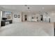 Spacious bonus room with built-in bar, plush carpet, and neutral decor at 978 Signet Dr, Apollo Beach, FL 33572