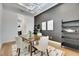 Chic dining area with statement lighting, elegant decor, and an open-concept layout at 978 Signet Dr, Apollo Beach, FL 33572