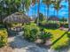 Relax and unwind in one of the lovely garden gazebos, surrounded by tropical landscaping at 978 Signet Dr, Apollo Beach, FL 33572