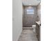 Updated bathroom with walk-in shower with tiled walls and vanity with modern fixtures at 10115 Briar Cir, Hudson, FL 34667
