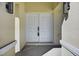 A close up of the double doors at the main entrance at 10115 Briar Cir, Hudson, FL 34667