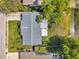 Real estate featuring a well-maintained property and landscaping, near waterways and commercial amenities at 10125 Cherry Creek Ln, Port Richey, FL 34668