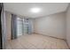 Spacious room with neutral paint and a window provides natural light at 10125 Cherry Creek Ln, Port Richey, FL 34668