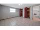 Tile bedroom with two closets and ample light at 10125 Cherry Creek Ln, Port Richey, FL 34668