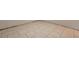 Close up of the tile floor, exhibiting a detailed pattern at 10125 Cherry Creek Ln, Port Richey, FL 34668