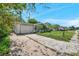Charming single-story home with attached garage and mature landscaping along long driveway at 10125 Cherry Creek Ln, Port Richey, FL 34668