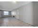 Bright room with tile flooring and multiple windows for natural light at 10125 Cherry Creek Ln, Port Richey, FL 34668