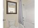 This bathroom has a vanity, toilet, mirror and shower at 10216 Summer Azure Dr, Riverview, FL 33578