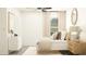 Bright bedroom with clean lines, neutral decor, natural light, and a modern design at 10334 Gentle Rain Dr, Land O Lakes, FL 34638