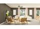 Inviting living room showcasing neutral tones, stylish furniture, and ample natural light at 10334 Gentle Rain Dr, Land O Lakes, FL 34638