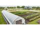 This vibrant community garden features plots, a greenhouse, and gathering spaces, enhancing the neighborhood's appeal at 10343 Gentle Rain Dr, Land O Lakes, FL 34638
