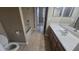 Comfortable bathroom featuring a tub, shower, sink, and toilet at 11341 Durham St, Parrish, FL 34219