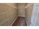 Walk-in closet with ample shelving and carpeting at 11341 Durham St, Parrish, FL 34219