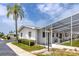 Charming single-story home featuring a screened-in lanai and well-maintained landscaping in a tranquil setting at 12400 Park Blvd # 417, Seminole, FL 33772