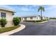 Well-maintained home with stone accents, mature landscaping, and a beautiful palm tree along a quiet street at 12400 Park Blvd # 417, Seminole, FL 33772