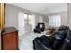 Inviting living room with leather seating, natural light and traditional decor at 12400 Park Blvd # 417, Seminole, FL 33772