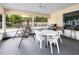 Enjoy the outdoors on this screened porch with furniture and a grill for outdoor dining at 12400 Park Blvd # 417, Seminole, FL 33772