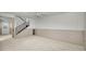 Spacious unfinished basement area featuring stairs, ready for custom renovations at 1660 Cape Ann Ne Ave # 2, St Petersburg, FL 33702
