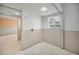 Spacious room featuring an open wall, bright window, and laundry hookups at 1660 Cape Ann Ne Ave # 2, St Petersburg, FL 33702