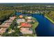 Aerial shot shows the community surrounding a winding blue lake at 17921 Arbor Haven Dr, Tampa, FL 33647