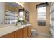 Neutral bathroom featuring single sink vanity and tiled floors at 17921 Arbor Haven Dr, Tampa, FL 33647