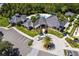 Aerial view of the community clubhouse surrounded by palm trees and landscaping at 17921 Arbor Haven Dr, Tampa, FL 33647