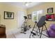 Bright exercise room featuring an elliptical, inversion table, and pilates balls at 17921 Arbor Haven Dr, Tampa, FL 33647