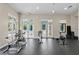Bright fitness center featuring modern cardio equipment and natural light at 17921 Arbor Haven Dr, Tampa, FL 33647