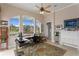 Cozy home office with views of the serene outdoors, creating a peaceful and focused workspace filled with natural light at 17921 Arbor Haven Dr, Tampa, FL 33647
