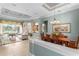Open-concept living space with tile flooring, elegant decor, and natural light at 17921 Arbor Haven Dr, Tampa, FL 33647