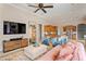 Spacious living room open to the kitchen, offering an open floor plan for entertaining or relaxing in style and comfort at 17921 Arbor Haven Dr, Tampa, FL 33647