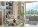 Elegant living room with a view to outdoor patio and pool beyond at 17921 Arbor Haven Dr, Tampa, FL 33647
