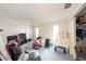Spacious bedroom with lots of natural light streaming through the windows and sliding door closet at 1808 Elmwood Dr, Oldsmar, FL 34677