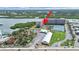 Located on the water, this condo is next to the tennis courts and a miniature golf course at 19451 Gulf Blvd # 205, Indian Shores, FL 33785