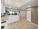 An open kitchen and living room area offers great flow for entertaining at 19451 Gulf Blvd # 205, Indian Shores, FL 33785