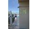The pool area gate and signage with pool rules offer clarity for the community residents at 19451 Gulf Blvd # 205, Indian Shores, FL 33785