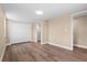 Bedroom featuring hardwood floors, neutral paint, a closet and an ensuite bathroom at 21536 Holdern Ave, Port Charlotte, FL 33952
