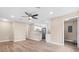 Bright, open floor plan with hardwood floors and updated kitchen featuring stainless steel appliances at 21536 Holdern Ave, Port Charlotte, FL 33952