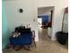 Bright dining area with a view into the living room, next to a kitchen appliance at 2175 20Th Sw Ave, Largo, FL 33774