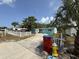 Charming single-story home with lush landscaping and a long driveway at 2175 20Th Sw Ave, Largo, FL 33774
