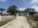 Charming single-story home with lush landscaping and a long driveway at 2175 20Th Sw Ave, Largo, FL 33774