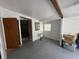 Garage space with exposed ceiling beams and ample storage potential at 2175 20Th Sw Ave, Largo, FL 33774
